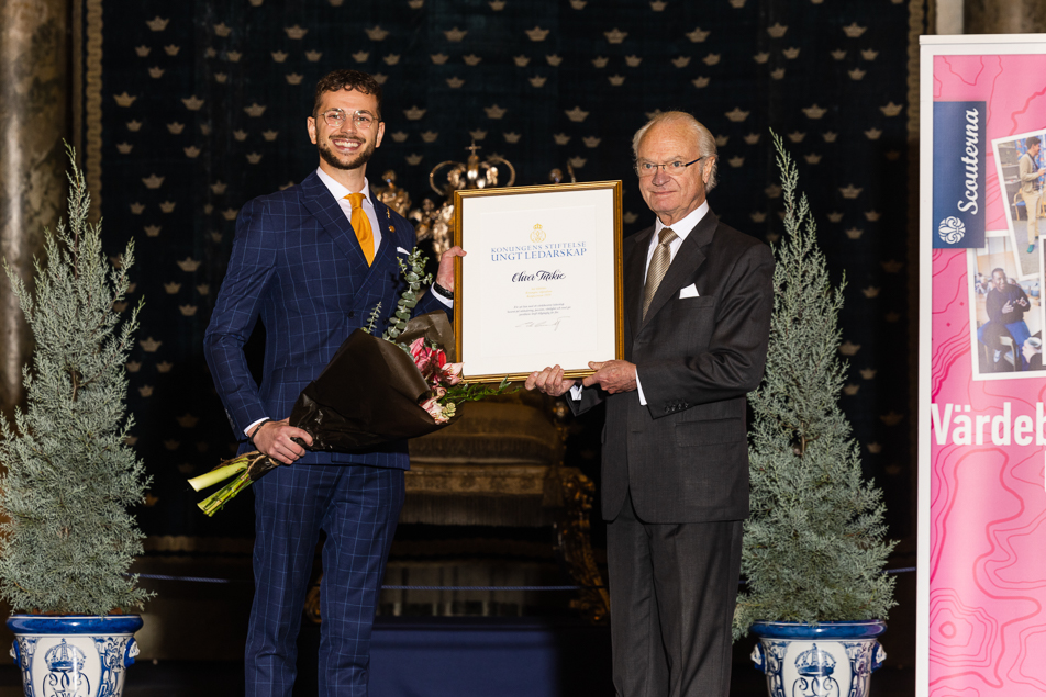 Oliver Titikic, co-founder of legal firm AURIX, receives one of the 2020 Compass Rose Scholarships from The King. 