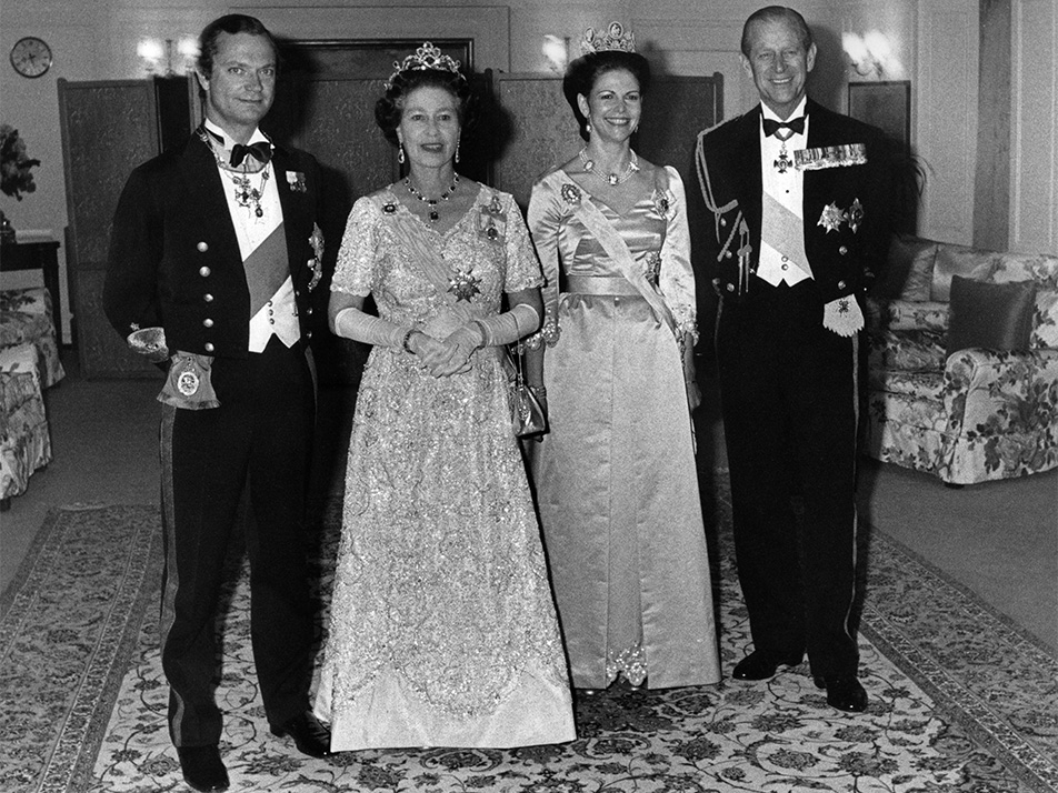 Kungaparet som gäster hos Drottning Elisabeth och Hertigen av Edinburgh på HMY Britannia i Stockholm 1983. Foto: Jan Collsiöö/TT