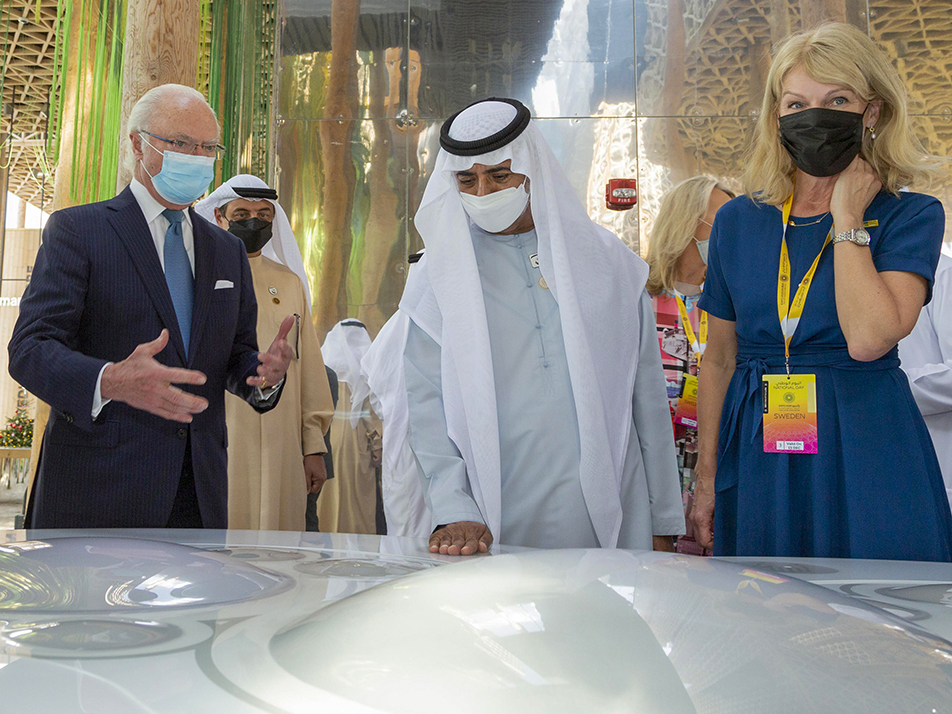 The King, Sheikh Nahyan Bin Mubarak Al Nahyan and Sweden's Minister for Foreign Trade Anna Hallberg at the Swedish pavilion.