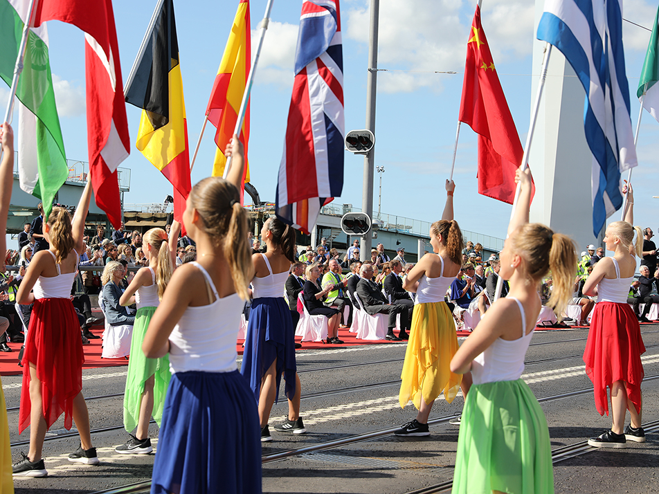 Gymnasts with flags during the opening ceremony. 