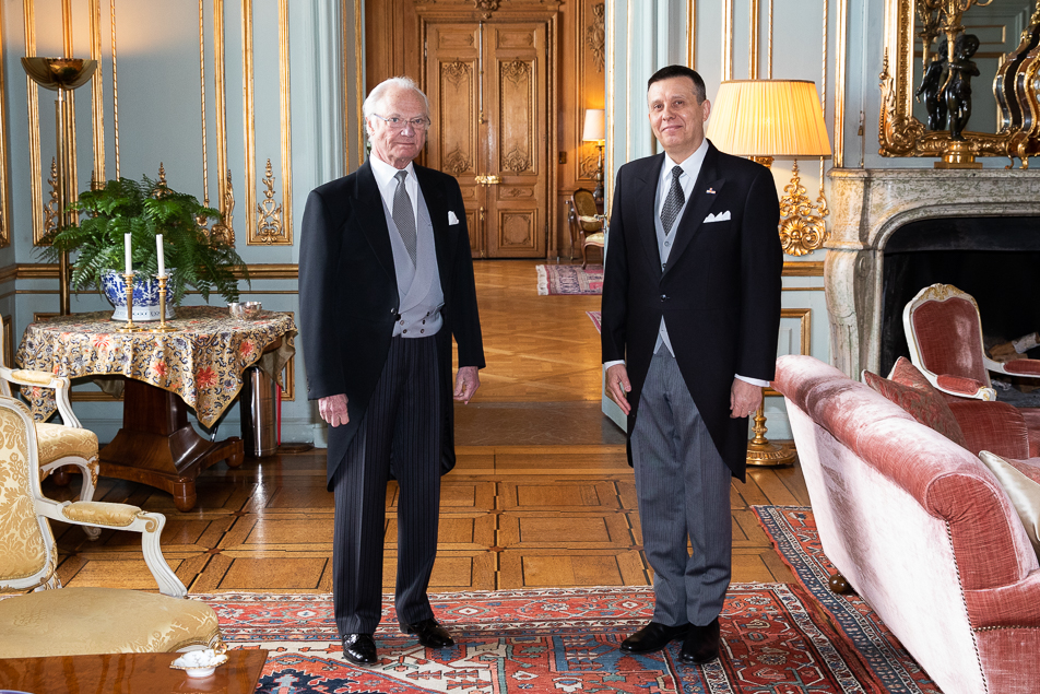 The King with Romania's ambassador Iulian Buga. 