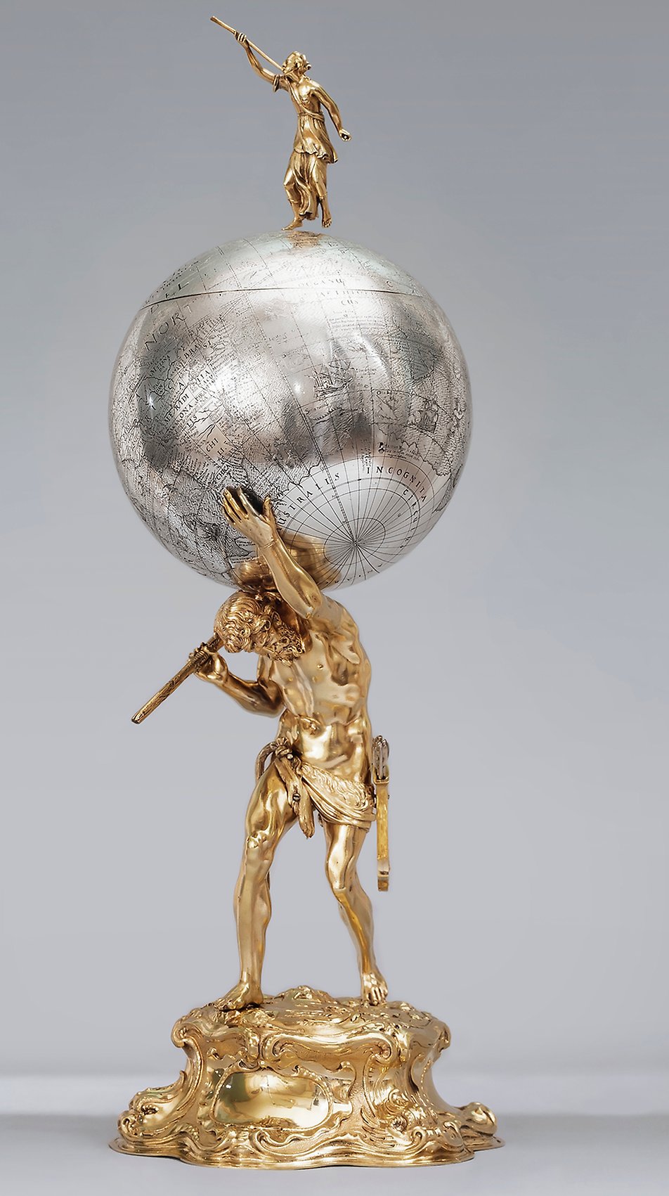 Cup, partly in gilded silver, in the form of Atlas carrying a celestial globe. Made in Nuremberg by goldsmiths Christoph Jamnitzer (1593–1618) and Jeremias Ritter (1605–1646). The top of the globe can be lifted off, and Minerva – the goddess of wisdom – stands on the top. Presented as a gift to King Gustav II Adolf by the citizens of Nuremberg on his entry into the city on 31 March 1632. 